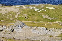 Ireland, County Donegal, Inishowen Peninsula, Malin Head, Eire sign painted on headland during WW2 to denote the country's neutrality.