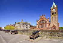 Northern Ireland, County Derry, The Guild Hall, view from the city's 17th century walls with a row of cannons in the foreground.