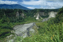 Indonesia, Sumatra, Canyon behind Bukittinggi with river flowing through tree coverd cliffs.
