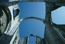 Portugal, Lisbon, Igreja do Carmo. View looking up to skeletal arches of the Carmelite church ruined in the earthquake of 1755 dating from the late 14th century.