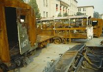 China, Beijing, Military Museum propaganda display of burnt out buses and army trucks resulting from alledged riots.