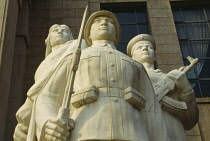 China, Beijing, Statue celebrating the navy aircraft and army forces outside the Beijing Military Museum.