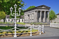 Ireland, County Offaly, Birr which is a town renowned for its Georgian architecture, John's Mall, Johns Hall and a streetlamp with the area known as The Chains in the foreground due to the sturdy chai...