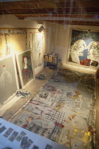 Italy, Tuscany, Lucca, Barga, View inside artists studio in the old town.