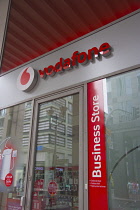 Germany, Berlin, Mitte, Friedrichstrasse, Vodafone shop sign.