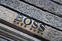 Germany, Berlin, Mitte, Friedrichstrasse, Hugo Boss fashion shop sign. **Editorial Use Only**