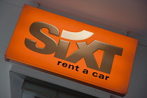 Germany, Berlin, Mitte, Friedrichstrasse, Sixt car rental shop sign. **Editorial Use Only**