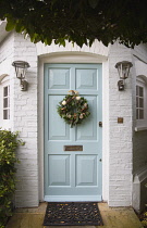 Religion, Festivals, Christmas, Floral wreath decoration on door.