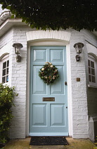 Religion, Festivals, Christmas, Floral wreath decoration on door.