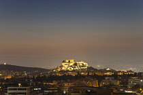 Greece, Attica, Athens, Acropolis, Parthenon illuminated at night.