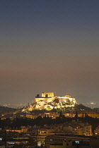 Greece, Attica, Athens, Acropolis, Parthenon illuminated at night.