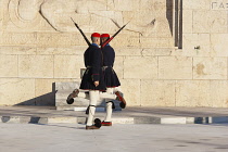 Greece, Attica, Athens, Evzones Greek soldiers on parade outside the Parliament building.