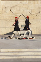 Greece, Attica, Athens, Evzones Greek soldiers on parade outside the Parliament building.