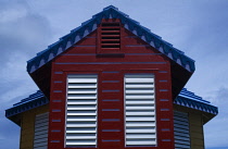 West Indies, Bahamas, Nassau, Compass Point, Architectural detail showing roof vent and window shutters.