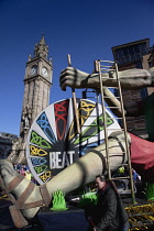 Ireland, North, Belfast, St Patricks Day parade passing the Albert clock on the corner of High Street and Victoria Street.