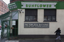 Ireland, North, Belfast, Exterior of the Sunflower public house on the cornber of Union Street and Kent Street , with security cage entrance.