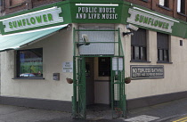 Ireland, North, Belfast, Exterior of the Sunflower public house on the cornber of Union Street and Kent Street , with security cage entrance.