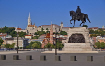 Hungary, Budapest, Statue of Count Gyula Andrássy, Hungary's Prime Minister between 1867 and 1871 with St Matthias Church and Castle Hill in the background.