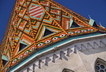 Hungary, Budapest, Matthias Church, Close up detail of the colourful majolica roof tiles.