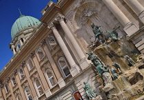 Hungary, Budapest, Angular view of Buda Castle with its dome and the Matthias Fountain on right.