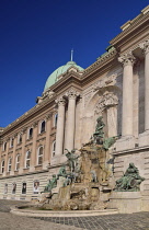 Hungary, Budapest, Buda Castle with its dome and the the Matthias Fountain below.