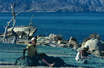 Qatar, General, Fishermen mending nets.