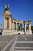 Hungary, Budapest, Heroes Square, The Millennium colonnade with a chariot representing Peace and various Hungarian historical figures below.