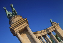 Hungary, Budapest, Heroes Square, The Millennium colonnade with a chariot representing Peace and various Hungarian historical figures below.