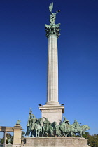 Hungary, Budapest, Heroes Square, The Millennium Monument with Archangel Gabriel on top and the 7 Maygar Chieftains below.