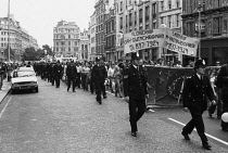 England, London, Gay Pride Parade, Strand, 1979, June 30, parade, banners, Metropolitan Police escort, Police sergeant, London Gay Switchboard, Gay Teachers Group.