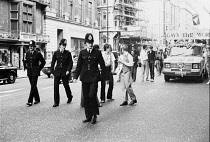 England, London, Gay Pride Parade, Piccadilly, Metropolitan Police escort, Ford Transit carnival float