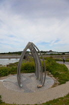 England, West Sussex, Shoreham-by-Sea, 2015 Air crash memorial sculpture by artists Jane Fordham and David Parfitt and positioned on the bank of the river Adur by the footbridge to the airport.