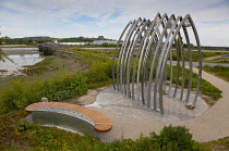 England, West Sussex, Shoreham-by-Sea, 2015 Air crash memorial sculpture by artists Jane Fordham and David Parfitt and positioned on the bank of the river Adur by the footbridge to the airport.