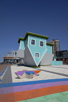 England, East Sussex, Brighton, Upside down house visitor attraction on the seafront.