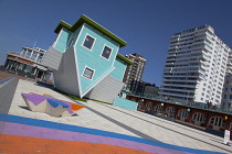 England, East Sussex, Brighton, Upside down house visitor attraction on the seafront.