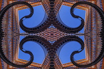 Germany, Bavaria, Munich, Four part composite of The Endless or Infinite Staircase sculpture by Olafur Eliasson with KPMG offices behind..