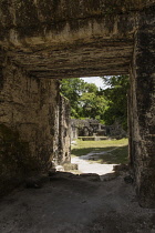 Guatemala, Entryway into the ruins of a palace in Group G of the archeological site of the pre-Columbian Mayan culture in Tikal National Park, UNESCO World Heritage site.