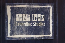 Ireland, North, Belfast, Cathedral Quarter, Sign for Half Bap recording studios in Commercial Court.