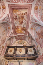 Slovenia, Upper Carniola, Bled, Bled Castle, The Gothic Chapel interior, frescoes on the ceiling and walls with gallery.