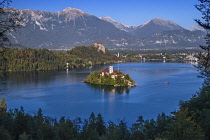 Slovenia, Upper Carniola, Bled, Lake Bled and Bled Island from the Osojnica Viewpoint with Bled Castle in the background.