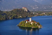 Slovenia, Upper Carniola, Bled, Lake Bled and Bled Island from the Osojnica Viewpoint with Bled Castle in the background.