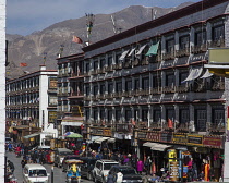 Apartments  and traffic on Beijing East Road in downtown Lhasa, Tibet.