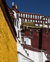 The Ganden Monastery sits at the top of a natural amphitheater on Wangbur Mountain.  It was founded in 1409 A.D.  but was mostly destroyed in 1959 by the Chinese military.   It has been partially rebu...