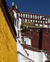 The Ganden Monastery sits at the top of a natural amphitheater on Wangbur Mountain.  It was founded in 1409 A.D.  but was mostly destroyed in 1959 by the Chinese military.   It has been partially rebu...