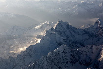 The Hengduan Mountains separate  the Tibetan Plateau from the Yunnan-Guizhou Plateau in western China in the region historically called Kham and is the home of the Khampa  or Khamba Tibetan people.  Aerial view between Chengdu, China and Lhasa, Tibet.