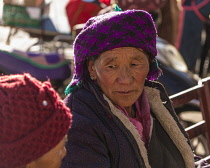 An older Tibetan woman visits with her friend in Lhasa, Tibet.
