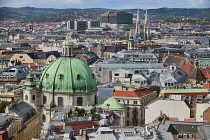 Austria, Vienna, Stephansdom or St Stephens Cathedral, View from the South Tower with Vienna in the background and the dome of Peterskirche and spires of the Votivkirche prominent..