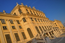 Austria, Vienna, Schonbrunn Palace, golden evening light on the rear facade.