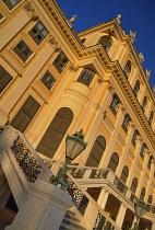 Austria, Vienna, Schonbrunn Palace, golden evening light on the rear facade.