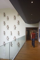England, Oxford, Ashmolean Museum, wall of busts.